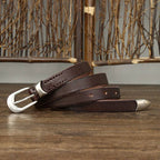 Dark brown women's belt, coiled view