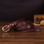 Dark brown women's belt, coiled view