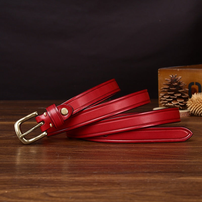 Red women's belt, brass buckle