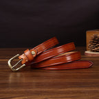 Red brown women's belt, coiled view
