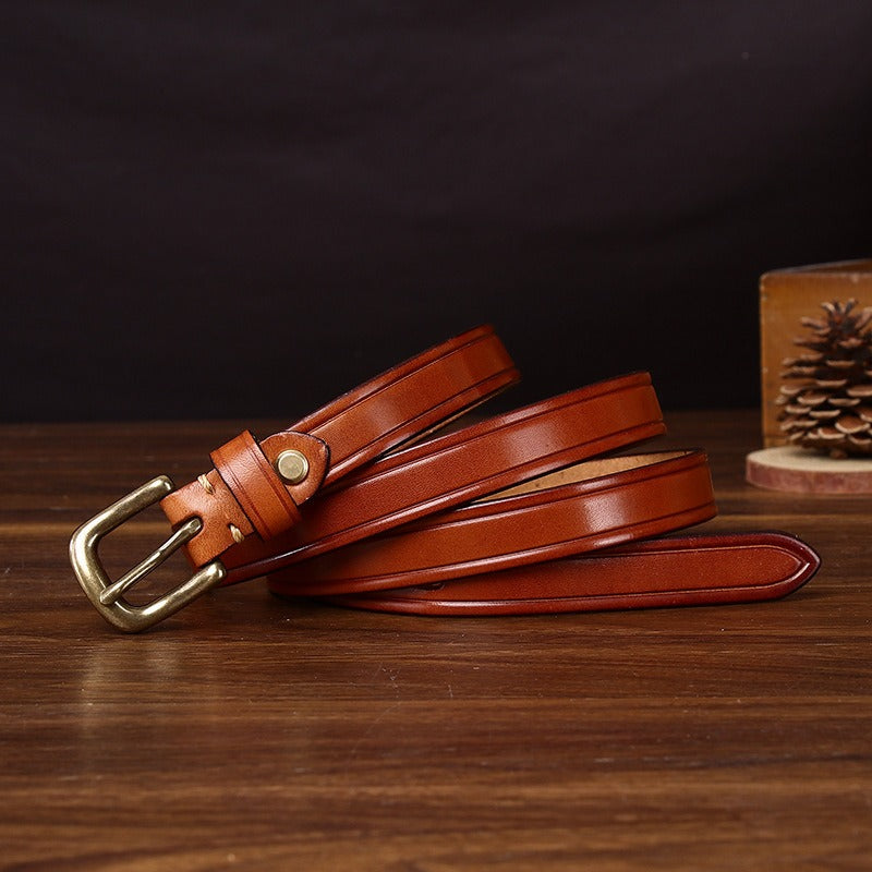 Red brown women's belt, coiled view