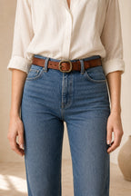Brown women's slim leather belt — model shot