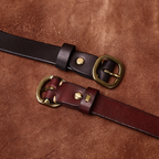 Brown women's slim leather belt — coiled