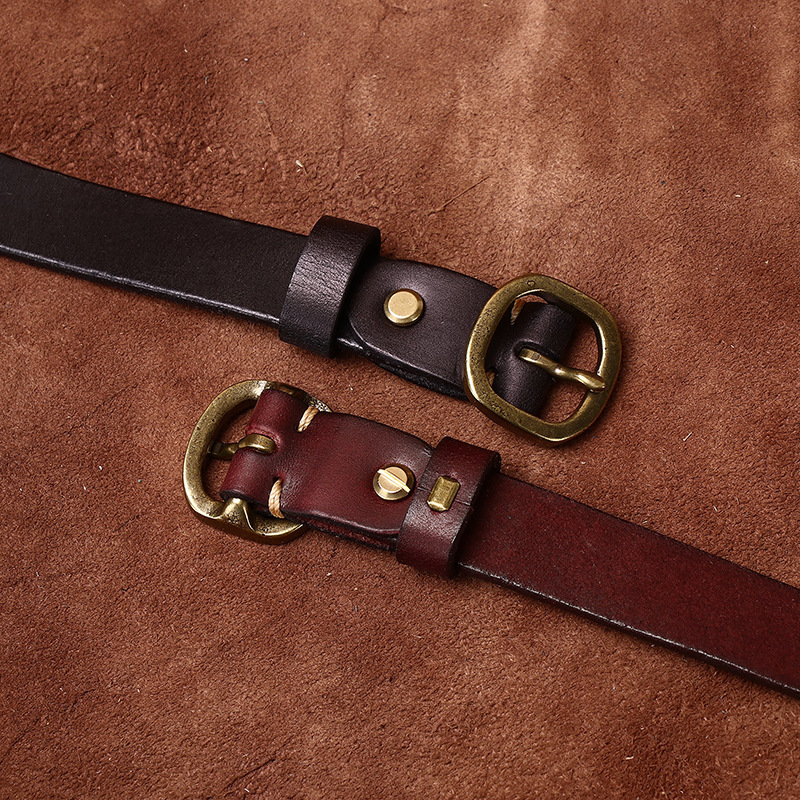 Brown women's slim leather belt — coiled