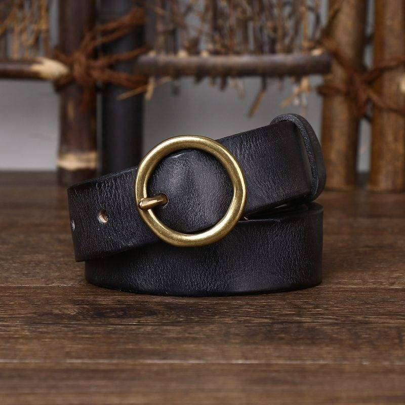 Black women's vintage round buckle leather belt detail
