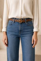 Brown women's vintage round buckle leather belt — model shot 2