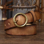 Brown women's vintage round buckle leather belt — buckle view