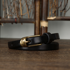 Black women's slim leather belt — buckle