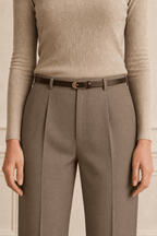 Dark brown women's slim leather belt — model shot