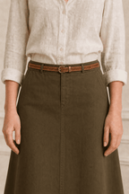 Woman wearing a brown stitched belt
