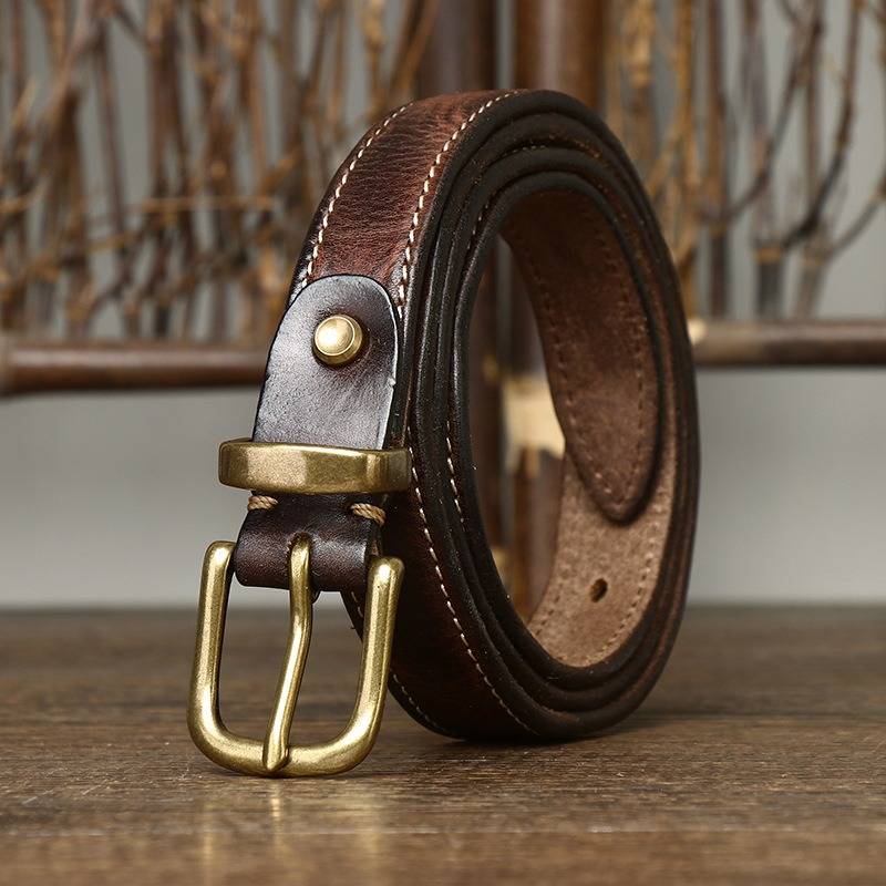 Dark brown women's belt, coiled view