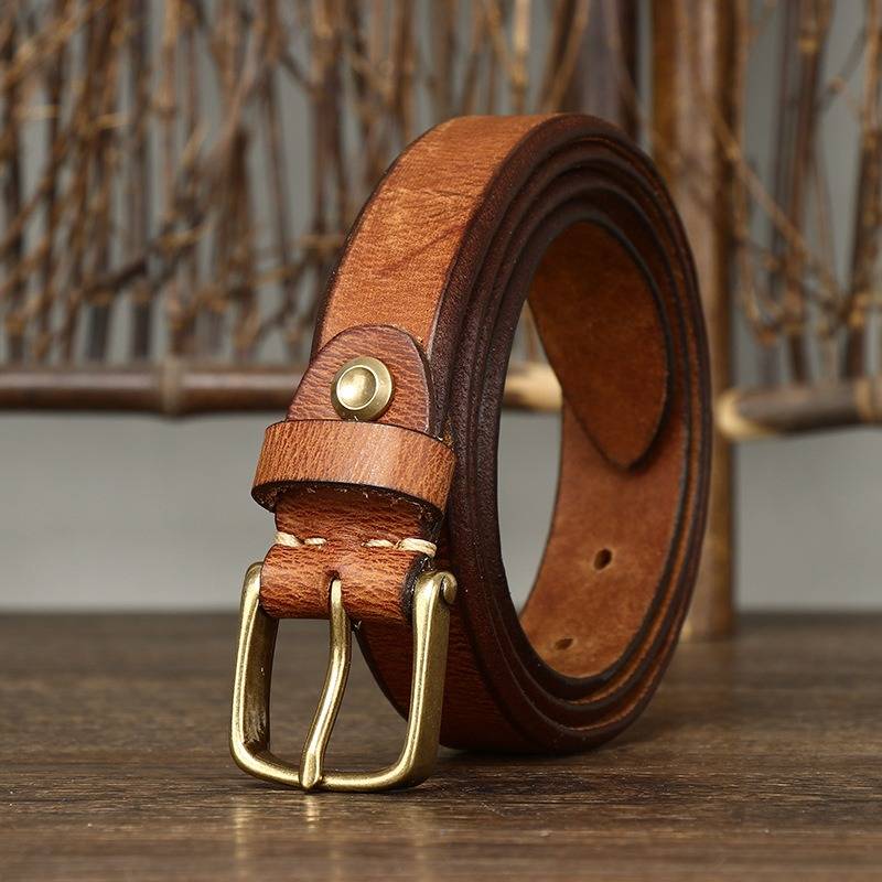 Brown women's belt, coiled view
