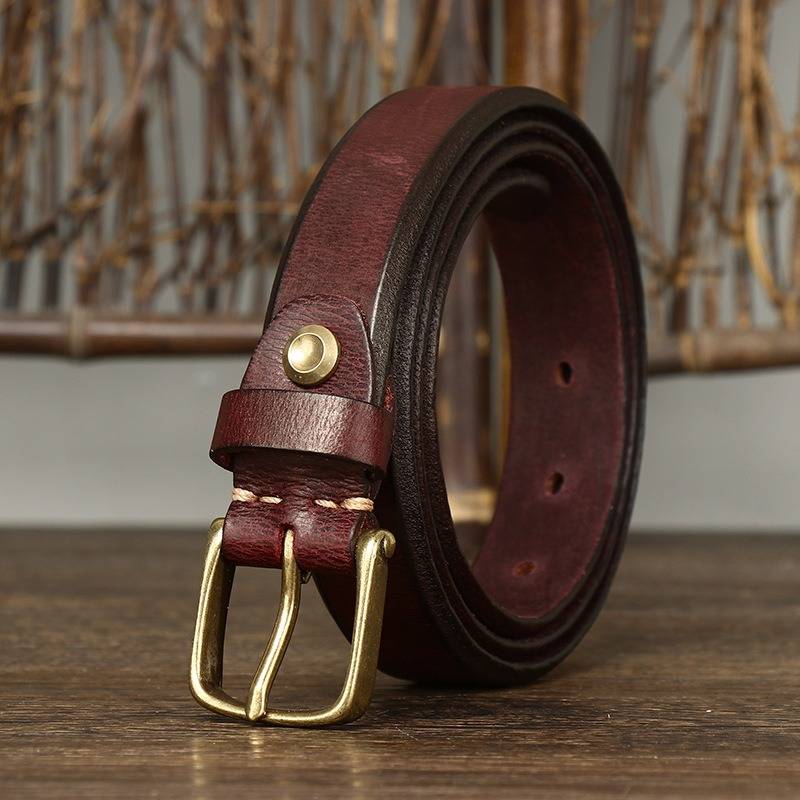 Red women's belt, coiled view