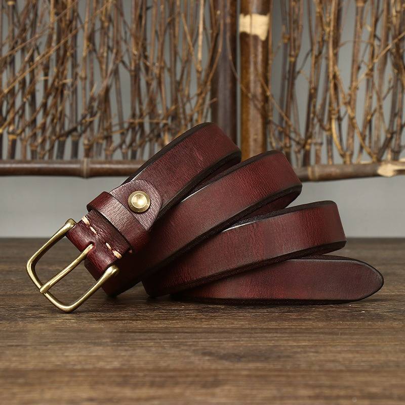 Red women's belt, brass buckle