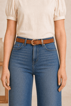 Woman wearing a brown western belt