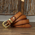 Brown women's belt, coiled view